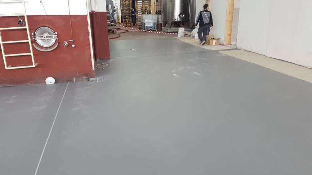 Pavimento di resina poliuretanica e cemento - Resin Floor srl